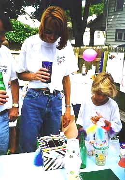 Wesley, Erin, and Monica check out the Exhibits.
